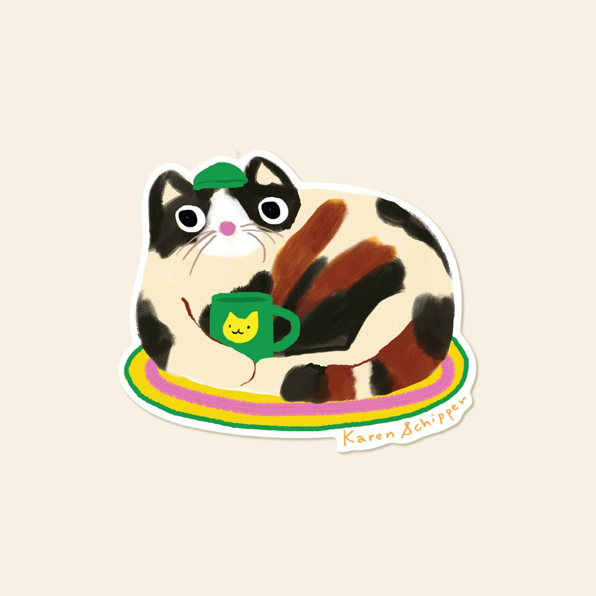 Vinyl sticker of a calico cat holding a green coffee mug