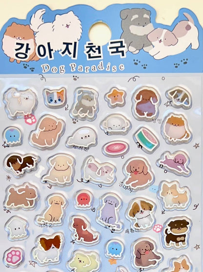 Dog Paradise sticker sheet with rounded dog faces, paws, bones, and hearts