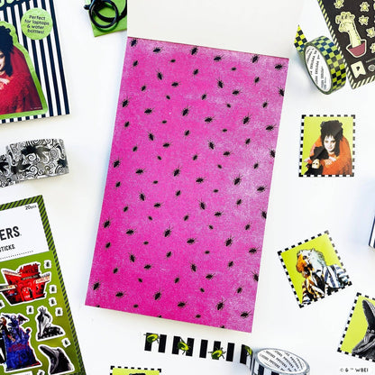 Purple sticker sheet with small black star/spot pattern