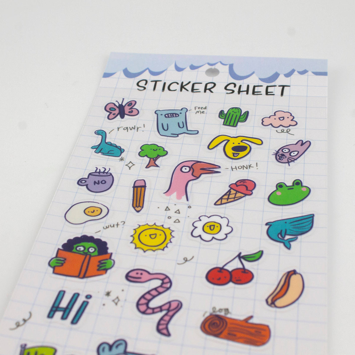 Clear sticker sheet with colorful cartoon animals, food, and text icons like “HI”