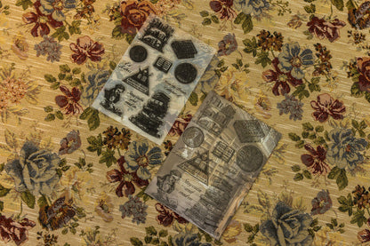 Clear stamp sheet with black-and-gray city buildings, circles, and small icons