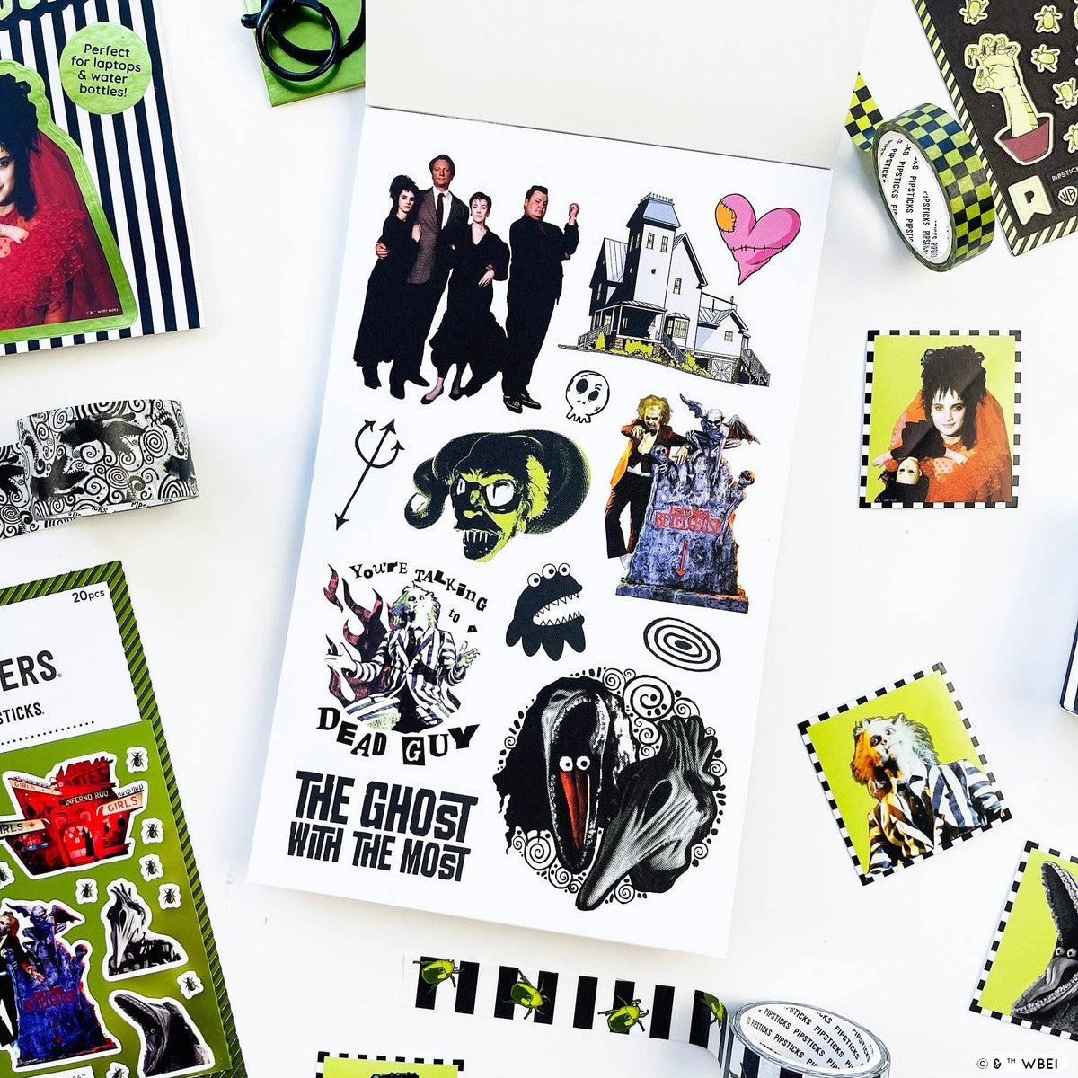 Sticker sheet with monsters, ghosts, and “DEAD GUY” themed graphic collage