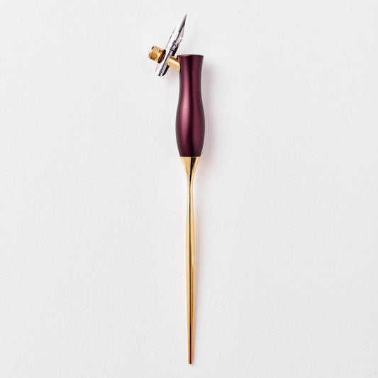 Calligraphy pen with oblique nib, maroon handle and gold barrel