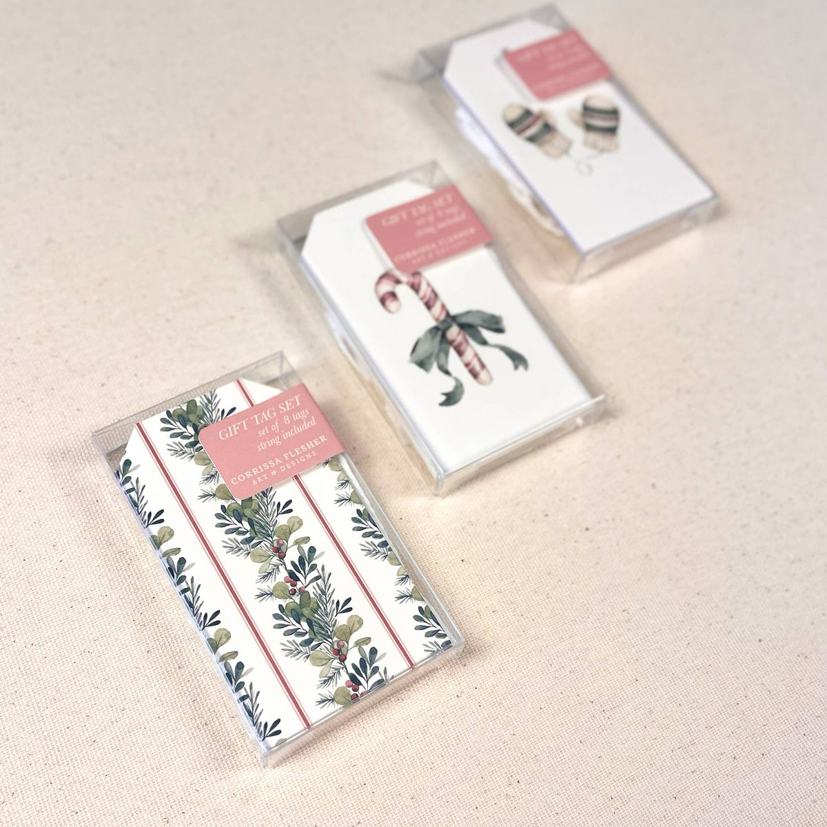 Packaged Christmas gift tag set with greenery and berries designs, includes two tags