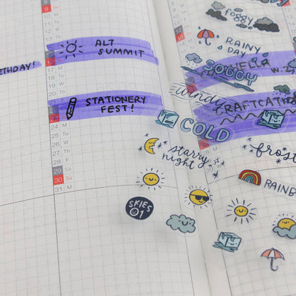 Planner page with weather sticker accents: cold, chilly, frosty, rainbow, and stormy