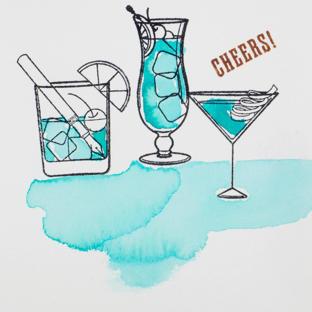Clear stamp set featuring cocktail glass and Cheers! stamps on paper