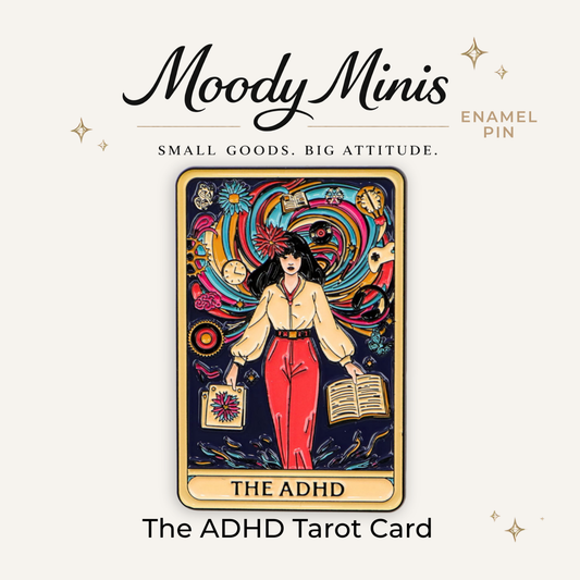 Enamel tarot-card pin with colorful woman holding a book, with THE ADHD text
