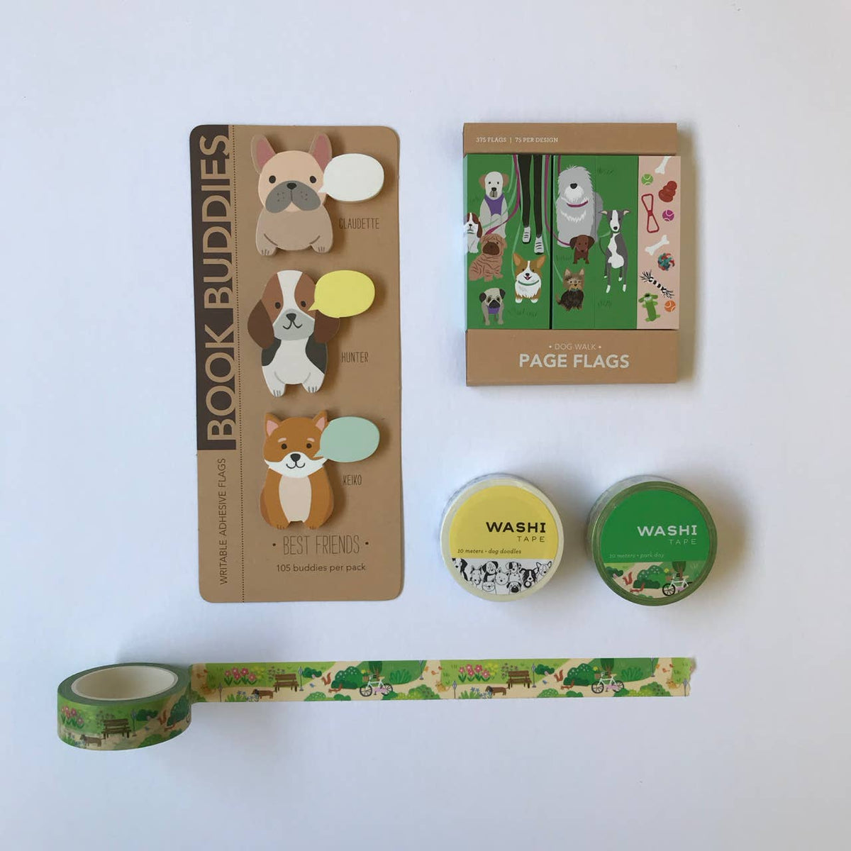 Set of dog-themed washi tape rolls and a decorative tape strip