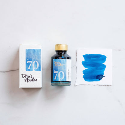 Shimmer ink bottle with Kingfisher blue swatch and matching ink box