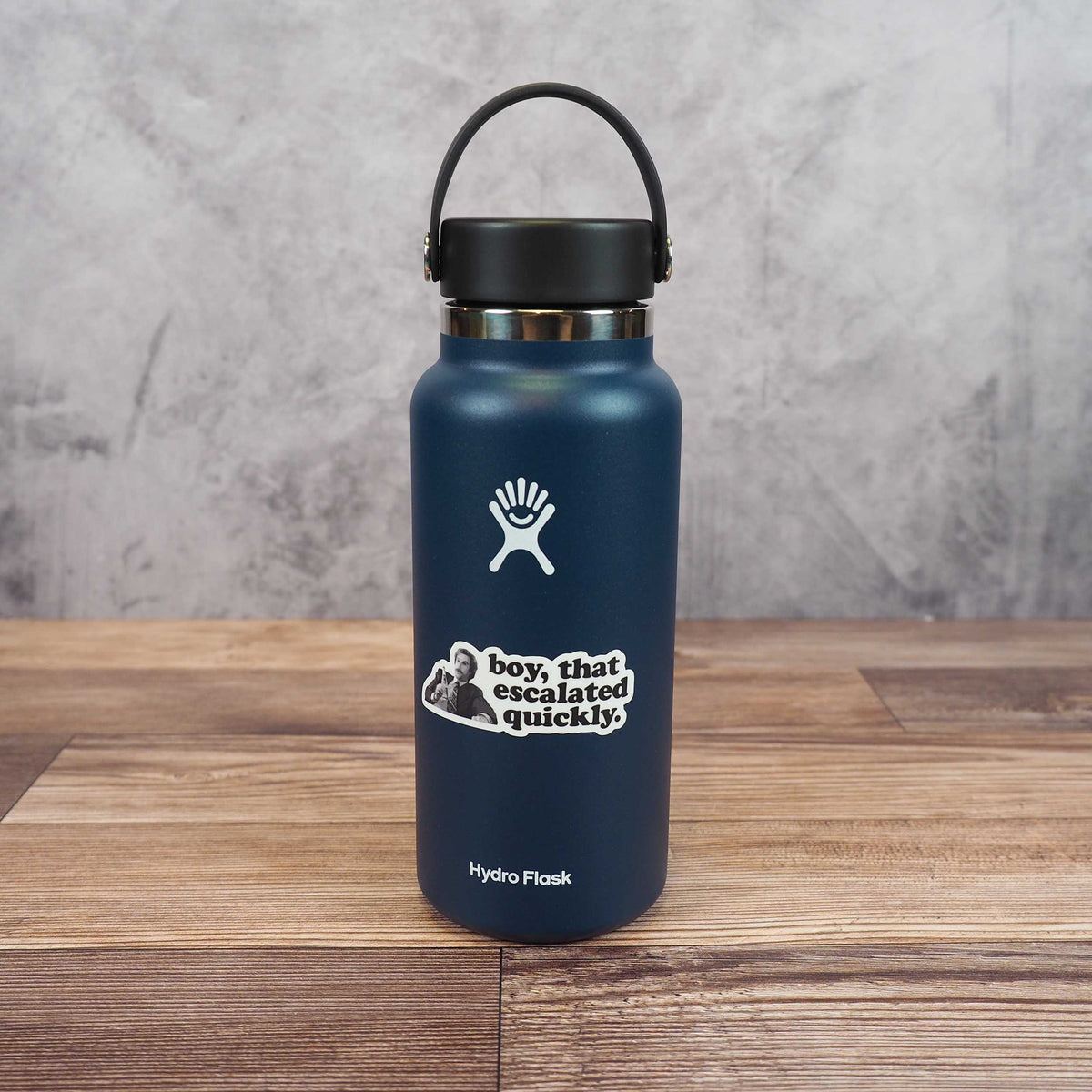 Boy escalated quickly quote sticker on blue insulated water bottle