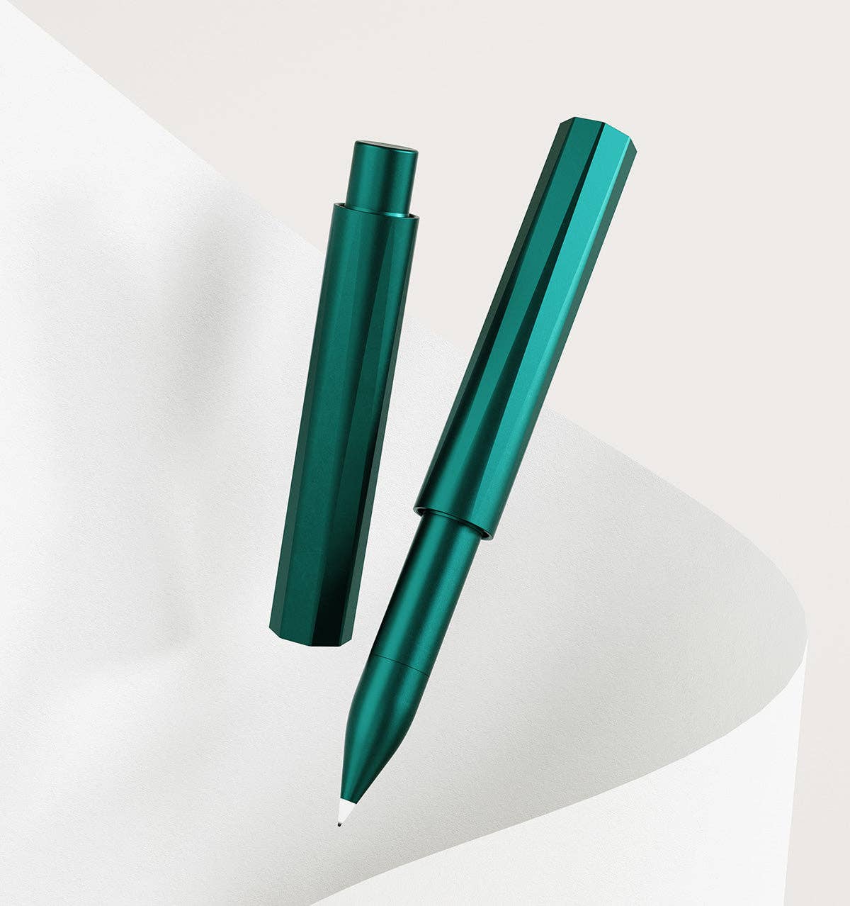 Refillable writing pen, dark teal body with cap and pointed tip