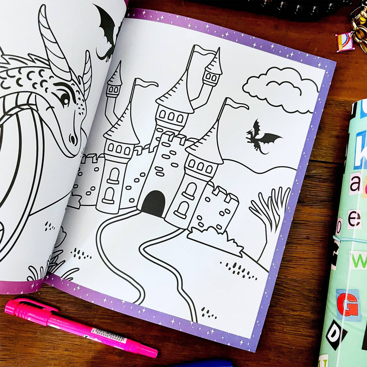 Sticker book coloring page with outline castle, dragon, and stars on purple border.