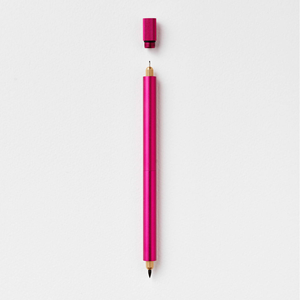 Refillable multi-tip pen, fuchsia body with gold nib and purple cap