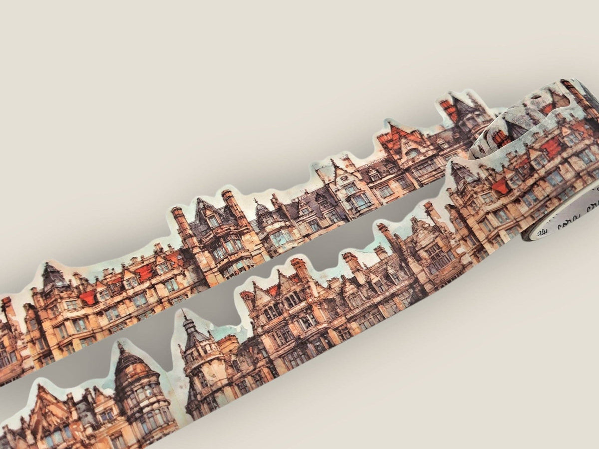 Decorative cutout tape featuring a detailed city skyline with house-shaped cutouts