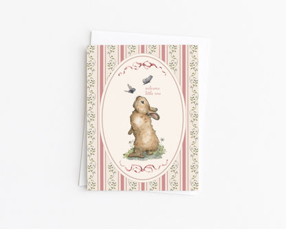 New baby greeting card with oval woodland rabbit and birds, striped floral border