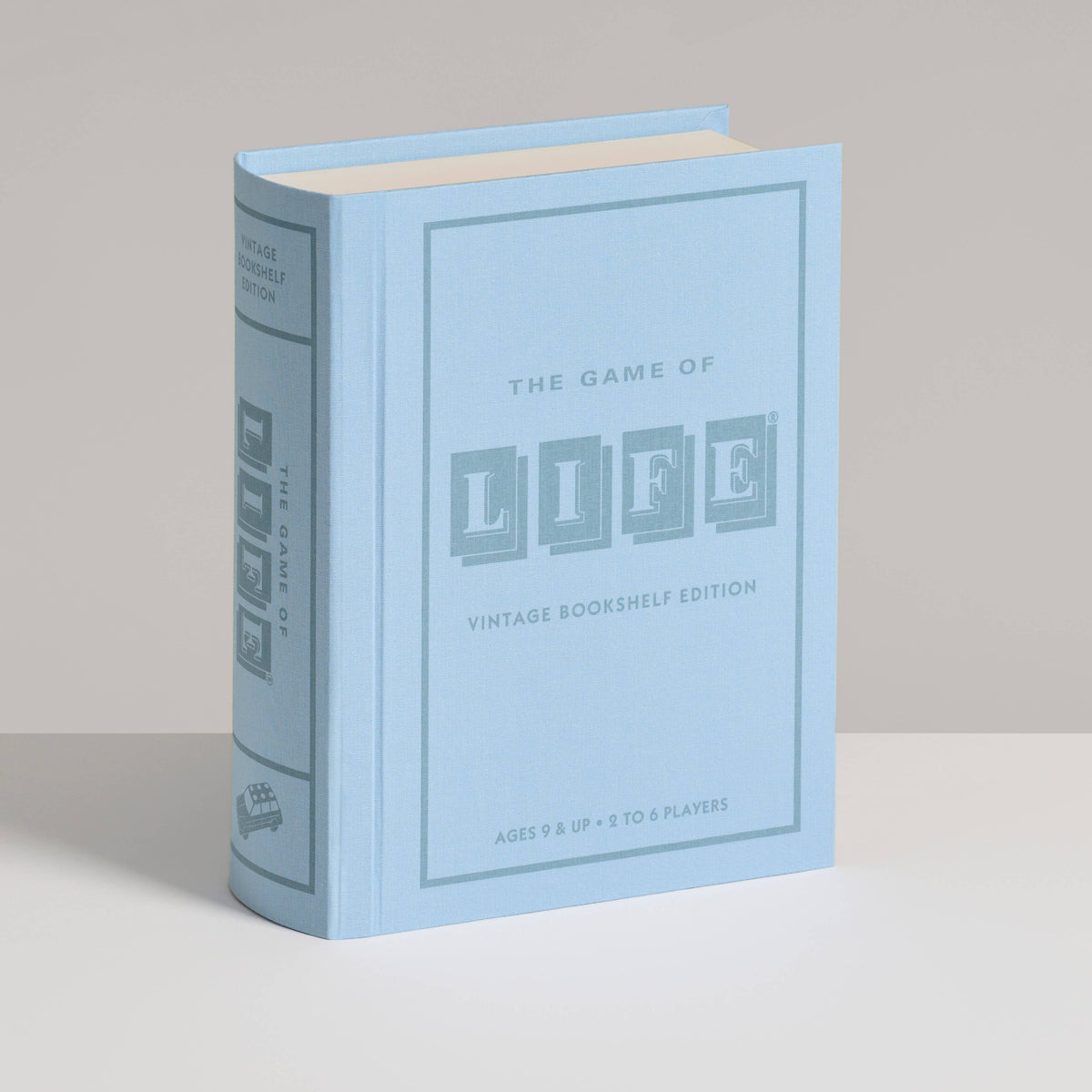 Light blue vintage board game bookshelf edition box with Life title on front