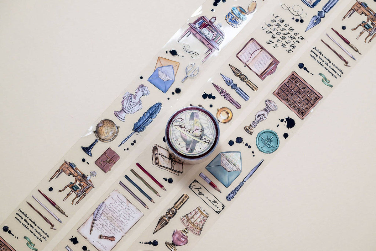 Decorative transparent tape roll with blue stationery icons and labels pattern