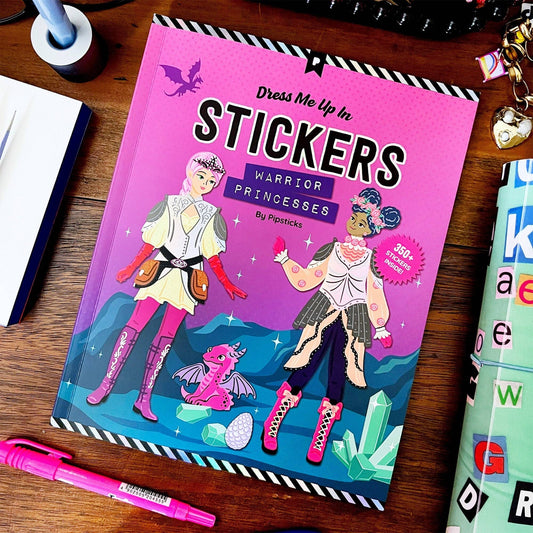 Warrior princesses sticker book front cover with illustrated characters and title on pink background.