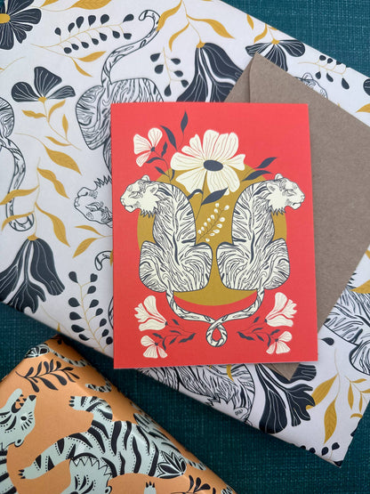 Greeting card with two tigers, flowers, and a kraft envelope
