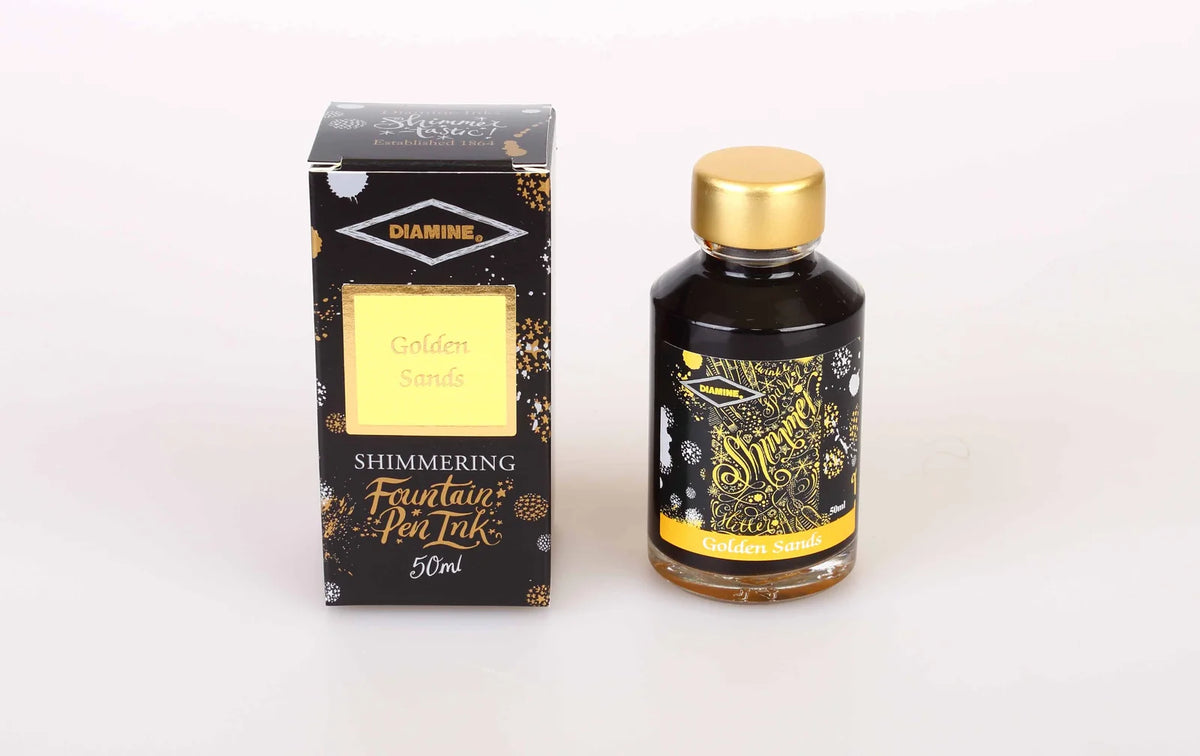 Shimmering fountain pen ink bottle and box, Golden Sands gold shimmer ink
