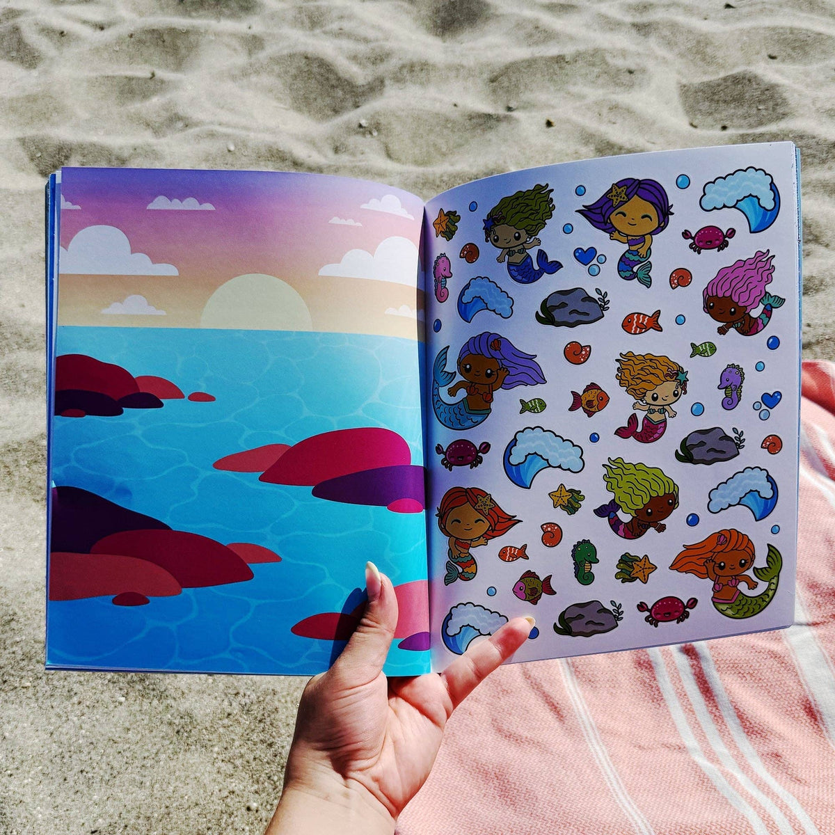 Draw-along sealife sticker book, open spread of colorful sea-creature sticker art
