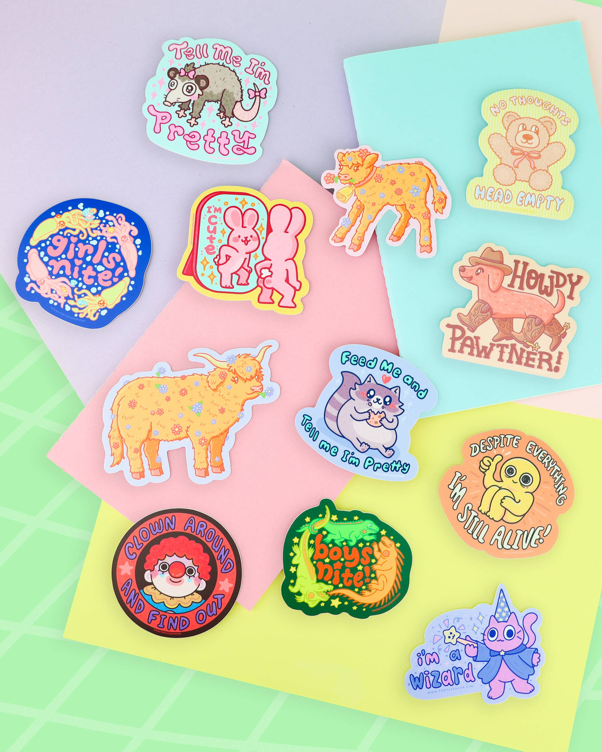 Vinyl sticker sheet with colorful animal stickers and playful text on pastel paper