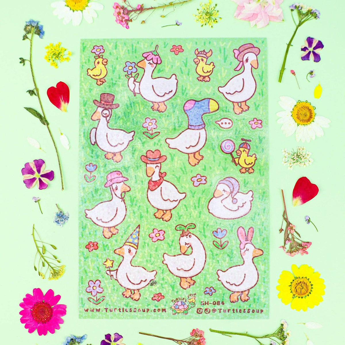Glitter sticker sheet featuring duck animals in hats and floral spring motifs