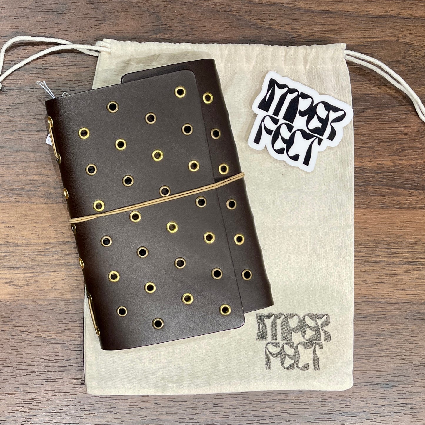 Imperfect Concepts: Juniper, Dark Brown, Grommet (A6-Trifold) 19