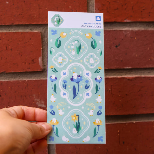 Washi sticker sheet with blue and green flower duck illustrations and small bird accents