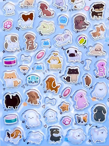 Holographic animal sticker sheet with cats, paw prints, and stars in light blue