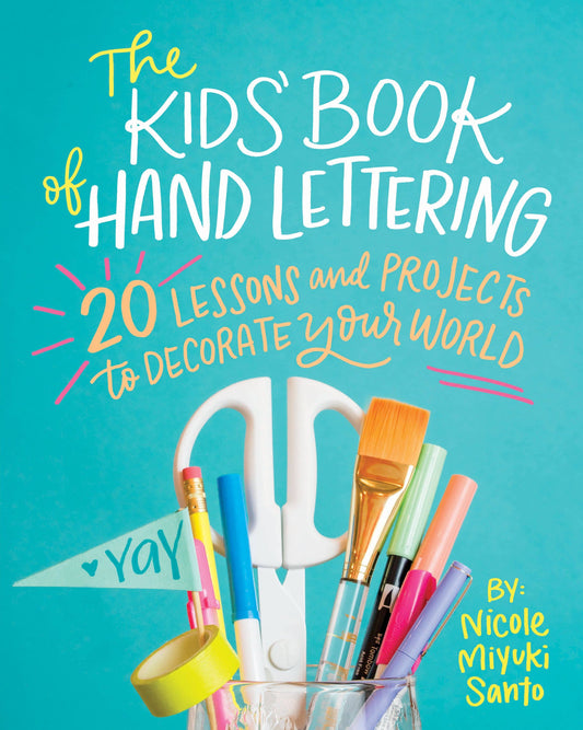 Kids' hand lettering book cover with colorful marker-style title and calligraphy brushes
