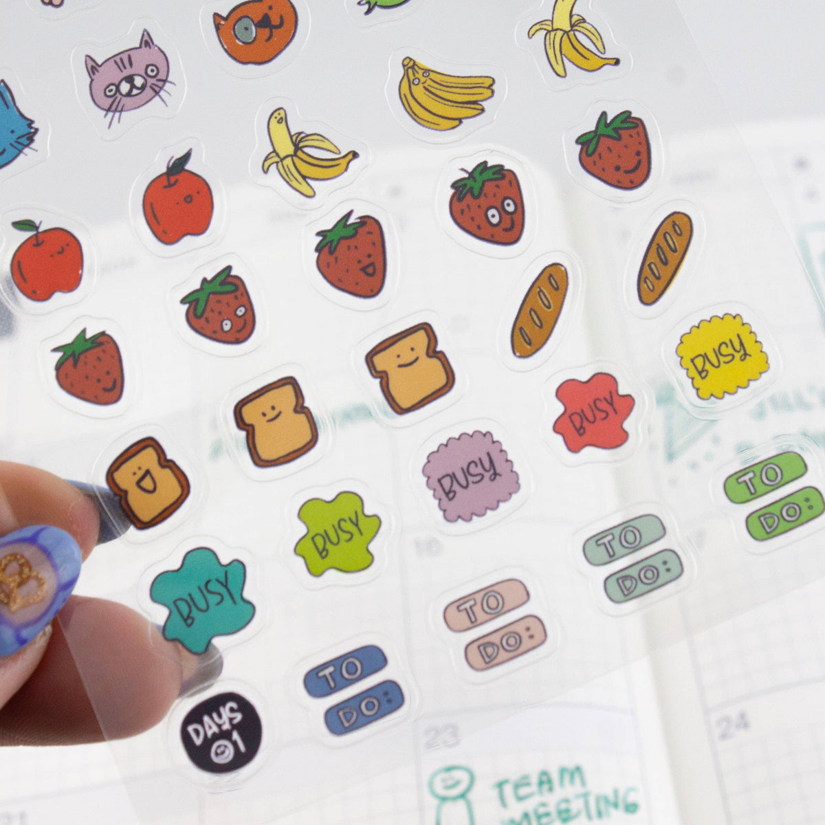 Planner sticker sheet detail with cat, strawberry, banana, to-do and busy labels