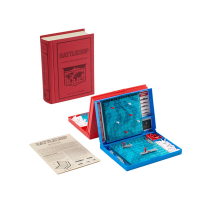 Bookshelf edition game set with open blue board, red box, and instruction handout