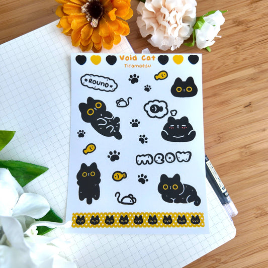 Void cat sticker sheet with black cats, paw prints, and yellow heart accents