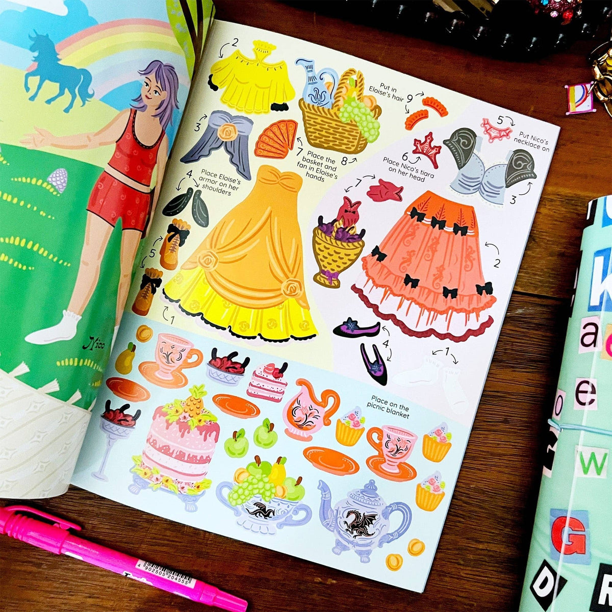 Sticker book activity pages with colorful dress designs, accessory icons, and numbered guides.