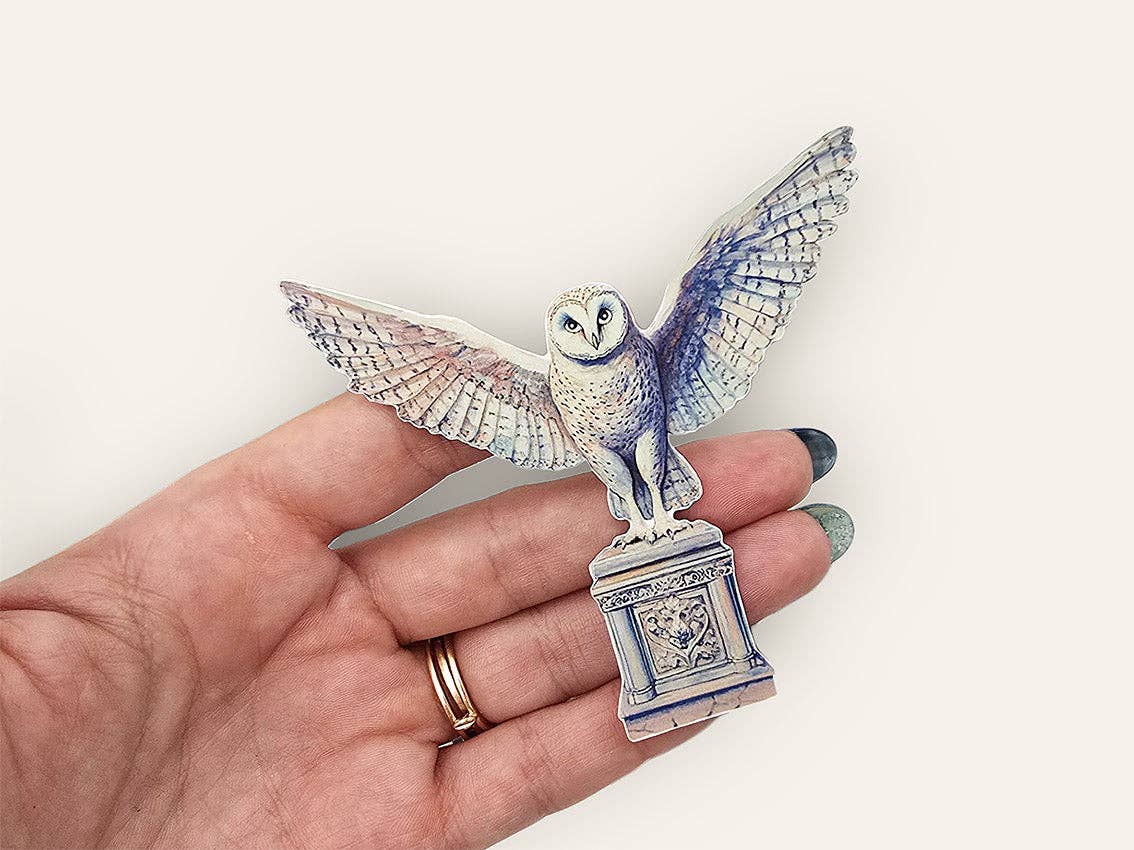 Academia sticker tin box sticker: blue-and-white owl perched on pedestal base
