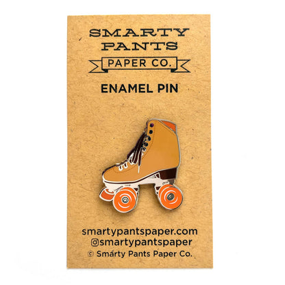 Brown roller skate pin with glow in the dark wheels