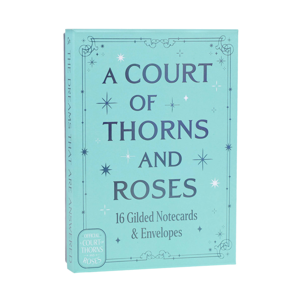 Teal gilded notecard box with gold 'A COURT OF THORNS AND ROSES' title and star details