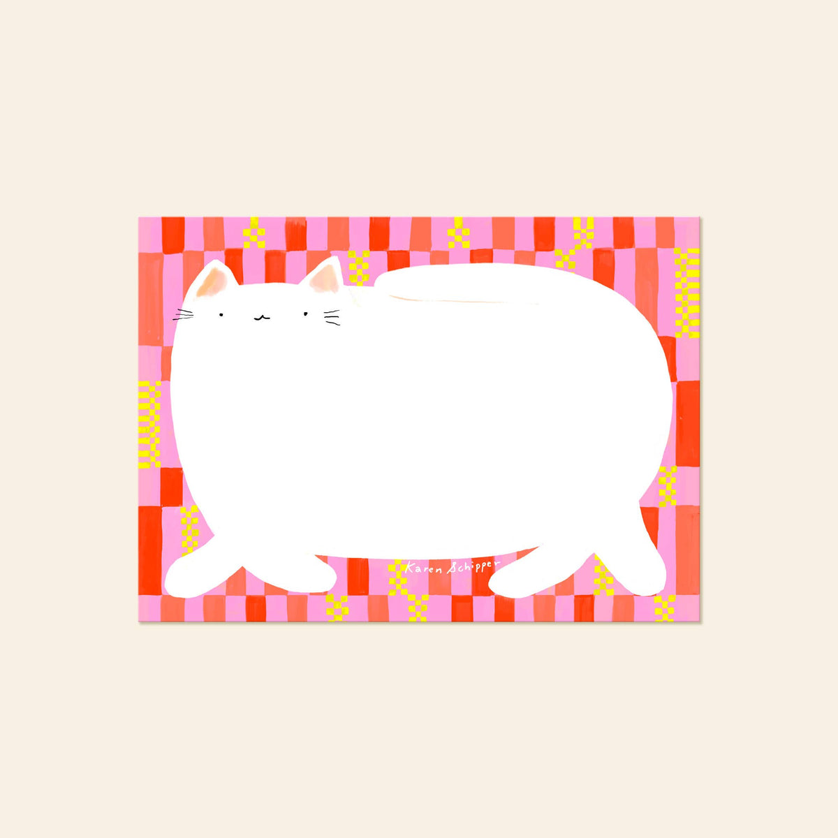 Cat-shaped notepad with a white cat design on a pink and coral checkered border