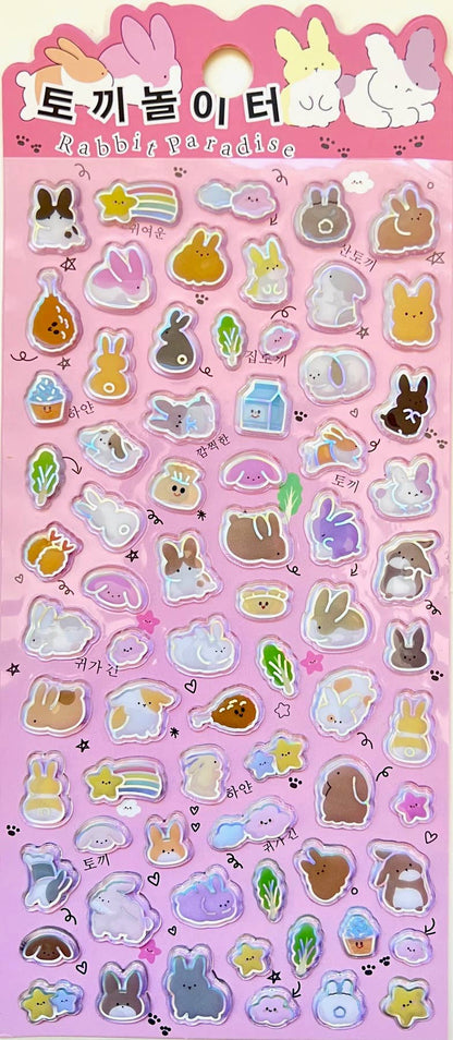 Rabbit paradise kawaii sticker sheet with glossy bunny and star shapes on purple