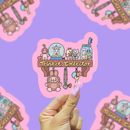 Vinyl sticker of Trinket Collector shelf with hanging chain and cute animal characters