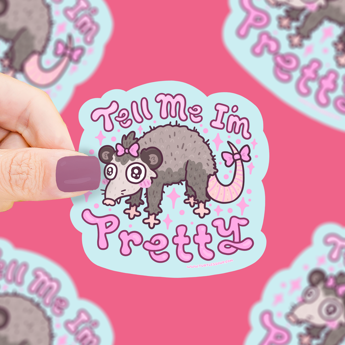 Vinyl sticker with cute opossum bow and 'Tell Me I’m Pretty' pink lettering