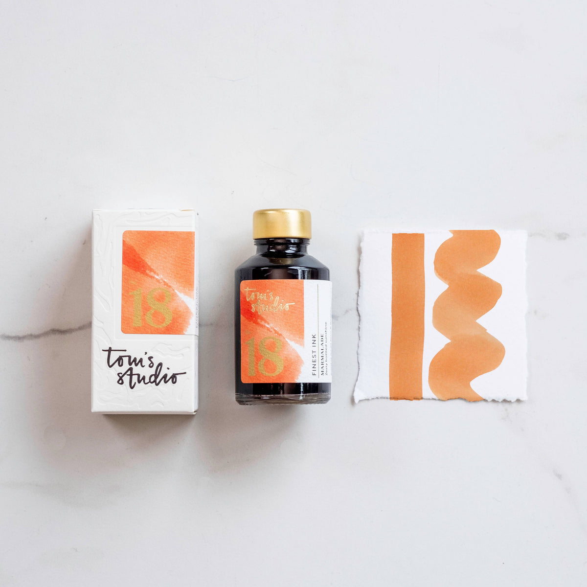 Marmalade fountain pen ink bottle with orange ink swatch and box
