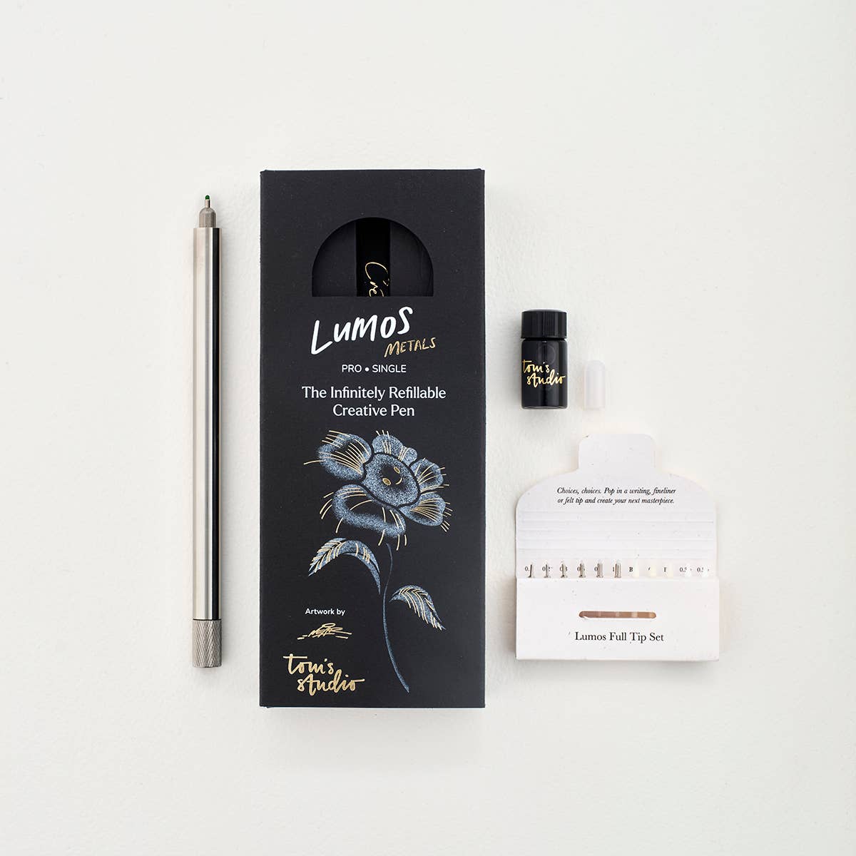Stainless steel fountain pen kit with pen, ink bottle, and included tip holder card
