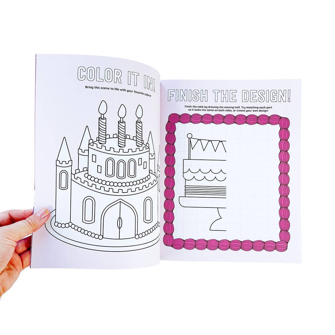 Open sticker activity book pages with castle outline and a pink bordered design box