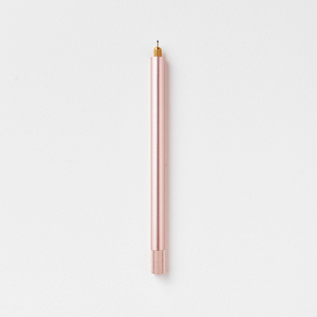 Refillable multi-tip pen, pale pink body with gold nib and pink cap