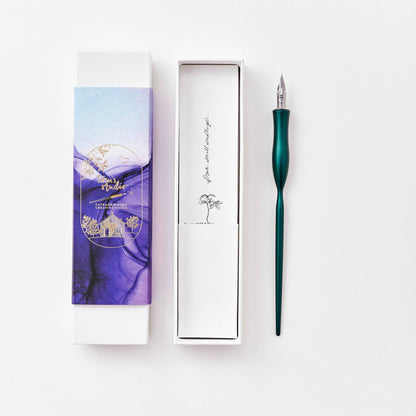Flourish calligraphy pen with teal barrel and fine nib