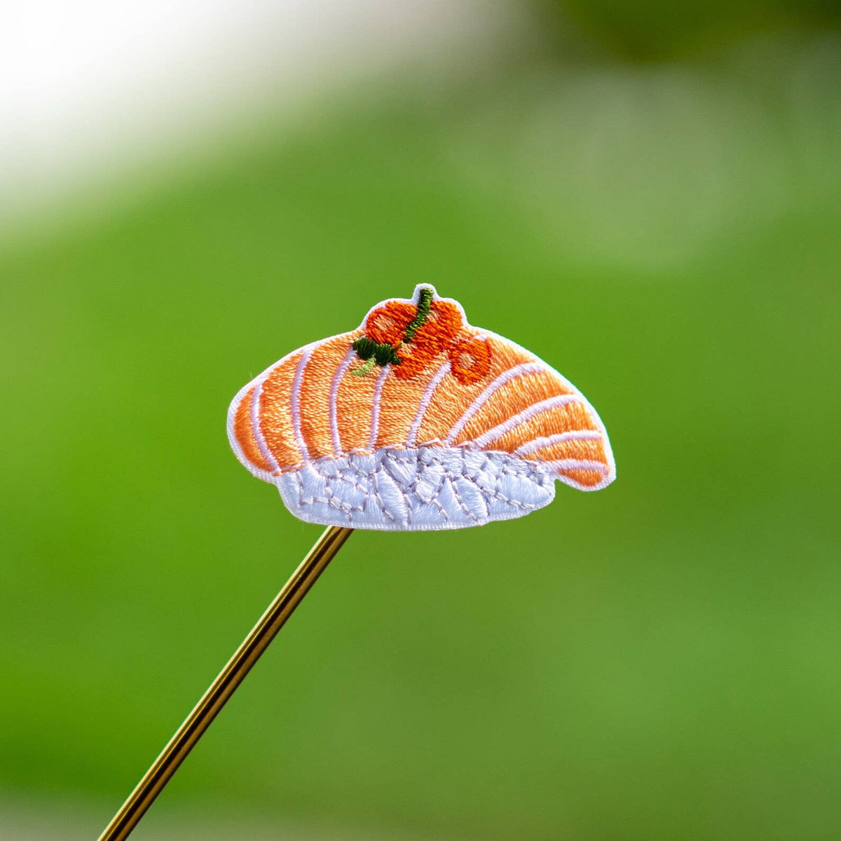 Embroidered shrimp sushi iron-on patch with pink-orange topping