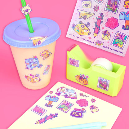Glitter sticker sheet with envelopes, gift boxes, and ink bottle icons