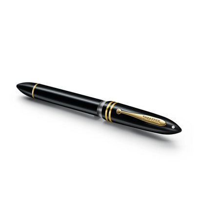 Glossy black fountain pen with gold cap band and clip